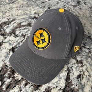 Gray New Era men’s grey steeler hat with Yellow Logo